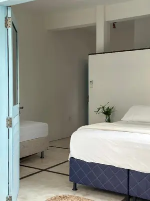 Uma cama ou camas num quarto em Vento do Ceará -Kitesurfing House- Preá