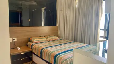 Uma cama ou camas num quarto em Flat Golden Flat Fortaleza