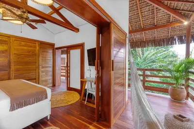 Uma cama ou camas num quarto em Deluxe Villa Luz Do Mar, rooftop Jacuzzi, vista mar