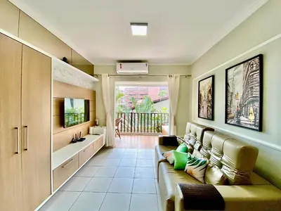 Uma televisão e/ou sistema de entretenimento em Apartamento Beach Park Living Resort Porto das Dunas