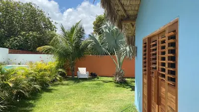 Um jardim no exterior de Maison Annick