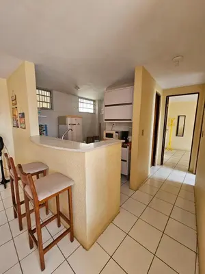 A cozinha ou kitchenette de Apartamento na Praia do Futuro a 100m da Praia Mobiliado