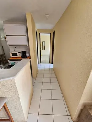 Uma área de estar em Apartamento na Praia do Futuro a 100m da Praia Mobiliado