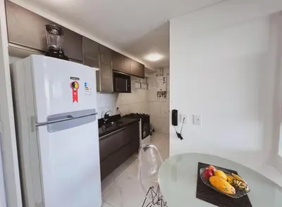 A cozinha ou kitchenette de Flat frente mar