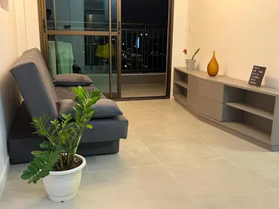 Uma área de estar em Apto Jardino - Parque Rachel de Queiroz