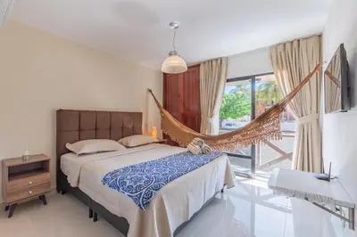Uma cama ou camas num quarto em Flat Eco Paradise Cumbuco - Ap 113
