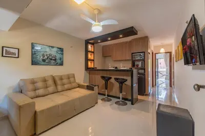 Uma área de estar em Flat Eco Paradise Cumbuco - Ap 113
