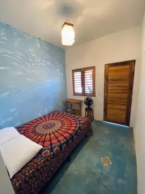 Uma cama ou camas num quarto em Stone Guajiru