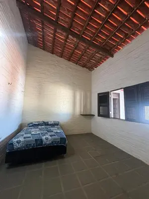 Uma cama ou camas num quarto em Casa com piscina próxima a praia de Águas Belas