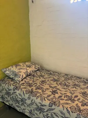 Uma cama ou camas num quarto em Casa com piscina próxima a praia de Águas Belas