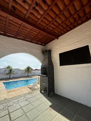 A piscina em ou perto de Casa com piscina próxima a praia de Águas Belas