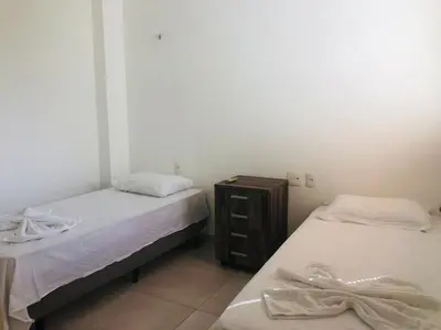Uma cama ou camas num quarto em WAI WAI Cumbuco - Frente a Praia