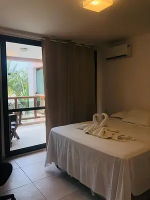 Uma cama ou camas num quarto em WAI WAI Cumbuco - Frente a Praia