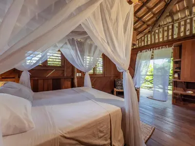 Uma cama ou camas num quarto em Barrinha dos Ventos Barrinha de Baixo Ceara Quartos Casas Kitesurf