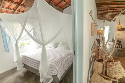Uma cama ou camas num quarto em Barrinha dos Ventos Barrinha de Baixo Ceara Quartos Casas Kitesurf