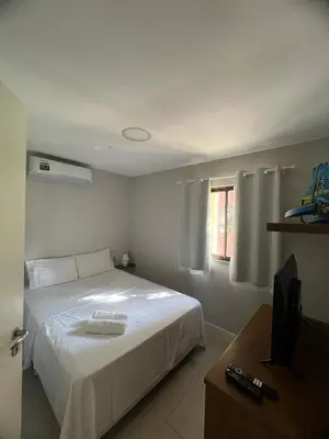 Uma cama ou camas num quarto em Cumbuco Dream