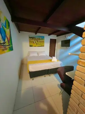 Uma cama ou camas num quarto em Vila do Sol Pousada