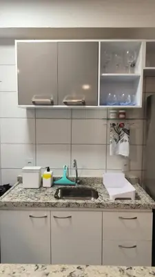 A cozinha ou kitchenette de Apartamento novo com jardim privativo!