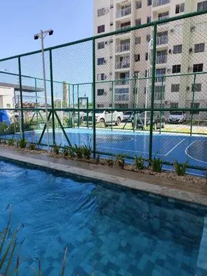 A piscina em ou perto de Apartamento novo com jardim privativo!