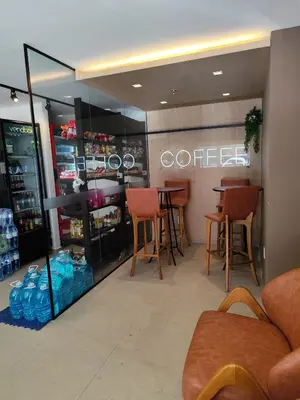 A área de bar ou lounge em Apartamento novo com jardim privativo!