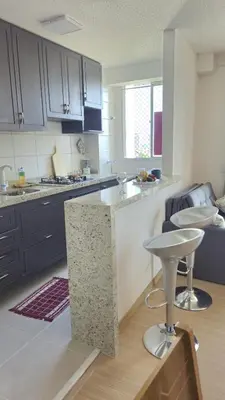 A cozinha ou kitchenette de Appartement tout confort au bord de mer