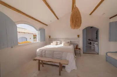 Uma cama ou camas num quarto em Vila Bento - Casas com conforto e sofisticação