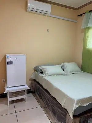 Uma cama ou camas num quarto em Flat Terra do Sol - Jijoca