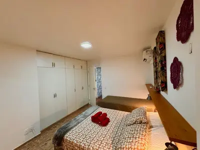 Uma cama ou camas num quarto em Beira Mar - Apartamento COM VISTA e SEM VISTA MAR