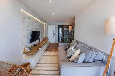 Uma televisão e/ou sistema de entretenimento em Luxo e Elegância com a melhor vista Praia Futuro