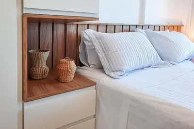 Uma cama ou camas num quarto em Luxo e Elegância com a melhor vista Praia Futuro