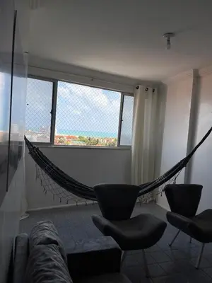 Uma área de estar em Apartamento Praia do Futuro, Fortaleza