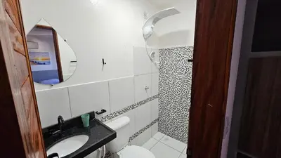 Uma casa de banho em Chalés Mediterraneo