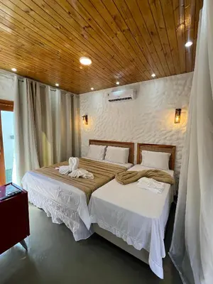Uma cama ou camas num quarto em Kanto do Chico Prime