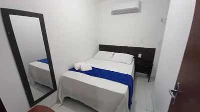 Uma cama ou camas num quarto em Casa da Lalá