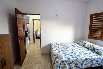 Uma cama ou camas num quarto em Casa Caminho das Dunas - Refúgio entre as Dunas e o Mar