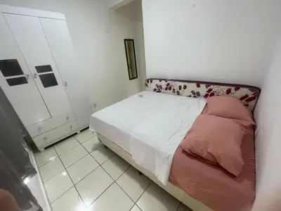 Uma cama ou camas num quarto em Apartamento completo