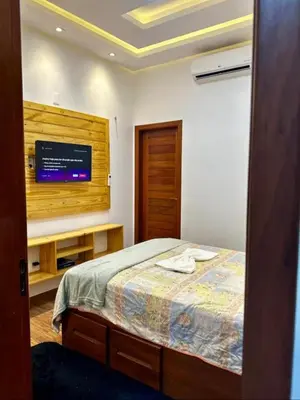 Uma cama ou camas num quarto em Apartamento completo em jijoca