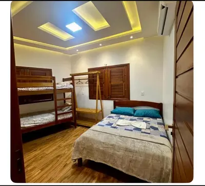 Uma cama ou camas num quarto em Apartamento completo em jijoca