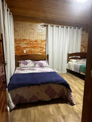 Uma cama ou camas num quarto em Espaço completo em jijoca