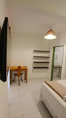 Uma cama ou camas num quarto em Villa Hê