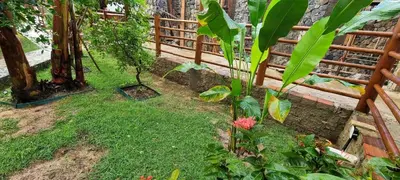 Um jardim no exterior de Casa de hóspedes Balibar Cumbuco