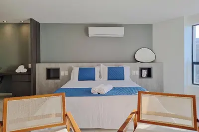 Uma cama ou camas num quarto em Iate Plaza #1404 - Studio vista mar by Carpediem