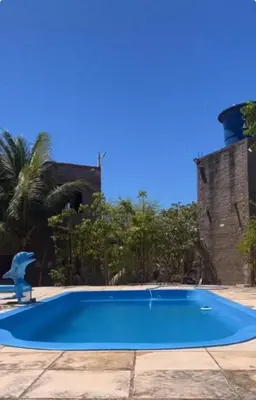 A piscina em ou perto de Chalé R&M