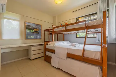 Uma cama ou camas num quarto em Beach Place #202 - Beira Mar por Carpediem