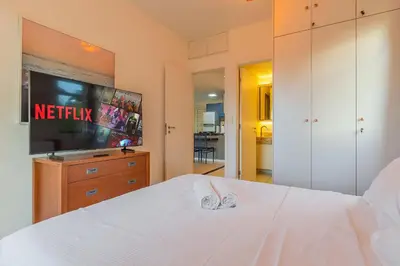 Uma cama ou camas num quarto em Beach Place #202 - Beira Mar por Carpediem