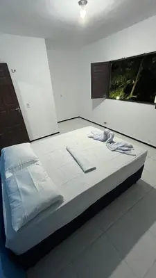 Uma cama ou camas num quarto em Pousada São João