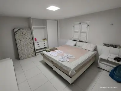 Uma cama ou camas num quarto em Casa na Praia de Águas Belas