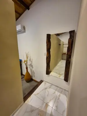 Uma cama ou camas num quarto em Biruta's Beach House Taíba