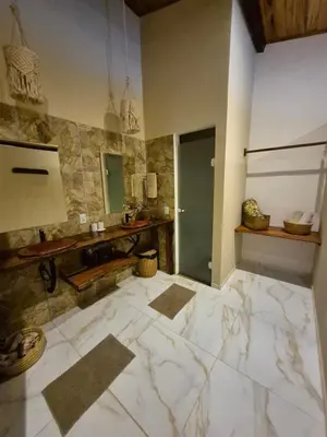 Uma cama ou camas num quarto em Biruta's Beach House Taíba