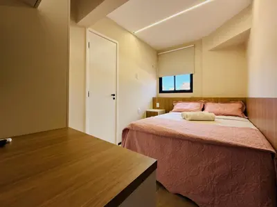 Uma cama ou camas num quarto em Flat Aquaville perto do Beachpark com 3 Suites